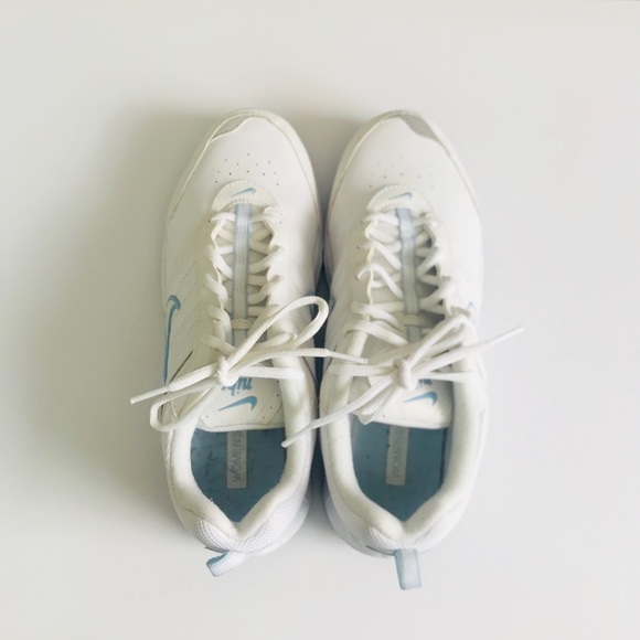 white nike with light blue swoosh